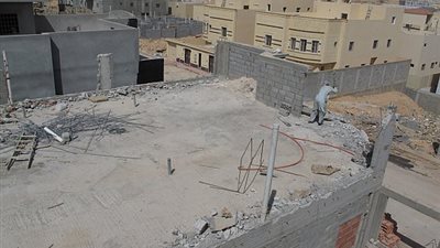 إخلاء عقارين مجاورين لعقار السيدة زينب المُنهار 
