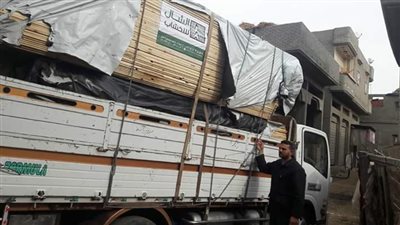 صور| قافلة مساعدات اجتماعية بمدينة المنزلة 