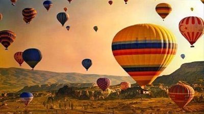 21 رحلة بالون طائر تزين سماء مدينة الأقصر