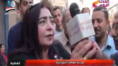 سيدة أمام لجان الانتخابات المصرية 2018: السيسي حمى أرضي وعرضي (فيديو)