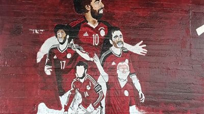 صور.. كوبري أكتوبر يتزين بلاعبي الفراعنة