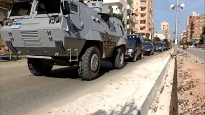 دوريات مكبرة لسيارات ومدرعات وقوات الشرطة بشوارع السويس
