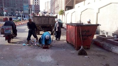 صور| تكثيف حملات النظافة والتجميل بحى شرق سوهاج