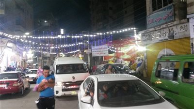 زحام مرورى فى شوارع وميادين المنصورة بسبب الإقبال على شراء المستلزمات الرمضانية