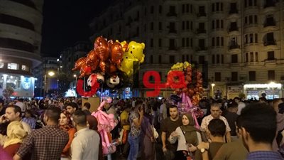 صور| فرحة وجنون في احتفالات ثاني أيام عيد الفطر 2018 في شارع الألفي 