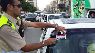 صور| استيكر على كل تاكسى بـ