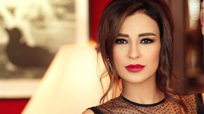 ماغي بو غصن برفقة المخرج فليب أسمر