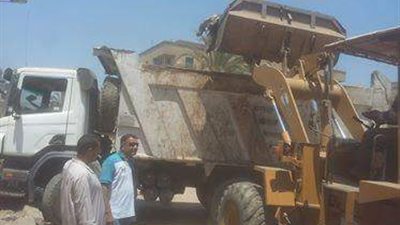 حملة نظافة مكبرة بشارع نادى الشرطة فى المحلة الكبرى