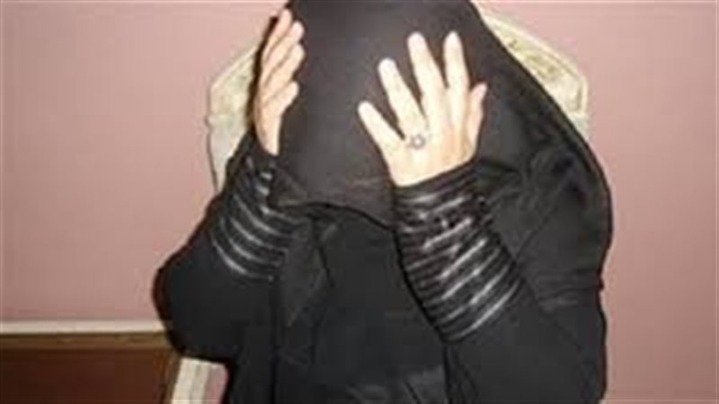 ضبط ربة منزل ونجليها