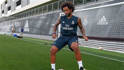 صور.. عودة مارسيلو إلي المدينة الرياضية بمدريد