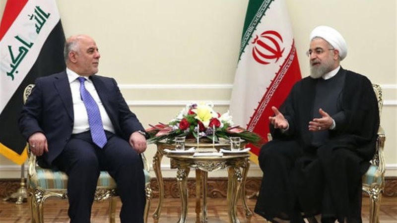 الرئيس الإيراني مع