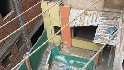 صور| أهالي عقار بالإسكندية يستغيثون :