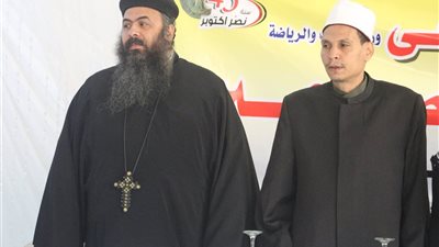صور.. ممثلى الأزهر والكنيسة يشاركون فى مسيرة السير بالجيزة 