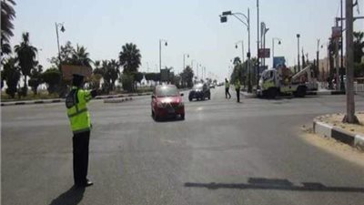 انتظام الحركة المرورية بالشوارع والميادين