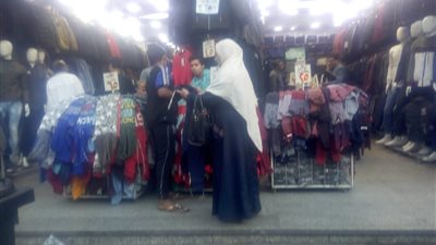 صور.. أسعار ملابس الشتاء ببعض محال الجيزة 