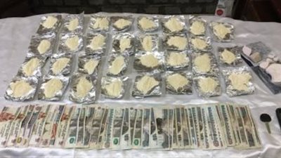 ضبط عاطل بحوزته بندقية آلية وربع كيلو هيروين  بالإسماعيلية