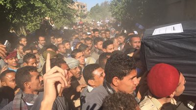 صور.. تشييع جثمان شهيد سيناء بمسقط رأسة في سوهاج 