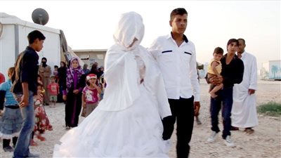زواج القاصرات في سوريا.. يبتعدن عن أحضان الحرب بالوقوع في مسئولية أسرة