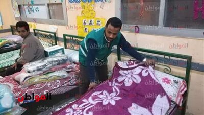 نقل الأسر المتضررة من العقار المنهار بالعجمي إلى مدرسة حسن صبحي 