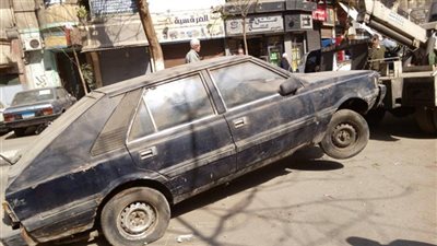 رفع 11 سيارة ودراجة بخارية مجهولة الهوية من شوارع محافظة القاهرة