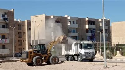 اعمال تسويه الشوارع امام مدرسه نجيب محفوظ بطور سيناء